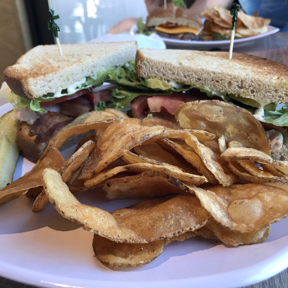 Clark's Fork - Clark's club ($8.95) + house-made kettle chips Background:  Banana Peppers & Beef Sandwich ($8.75) - New American Near Me - Spokane, Washington