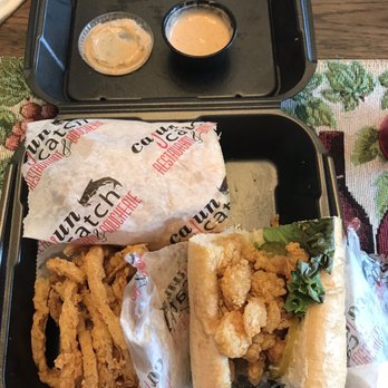 Cajun Catch - Shrimp poboy. Tasty and HUGE!!  The onion rings were great too! - Seafood Near Me - Zachary, Louisiana