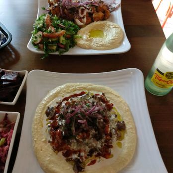 Levant Cafe & Grill - Hummus plate and chicken kebab with Lebanese salad. Yum! - Mediterranean Near Me - Cedar Park, Texas Levant Cafe & Grill - Hummus plate and chicken kebab with Lebanese salad. Yum! - Mediterranean Near Me - Cedar Park, Texas