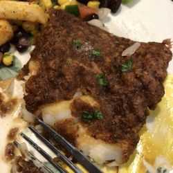 Jeff’s Kitchen - Greasy black fish. You can see grease next to the fish
