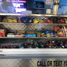 a vending machine with snacks and drinks a vending machine with snacks and drinks