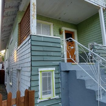 Neighbourhood Painters - Full exterior re paint side view in east Vancouver showing prepped and primed surfaces - Painters Near Me - Vancouver, British Columbia Neighbourhood Painters - Full exterior re paint side view in east Vancouver showing prepped and primed surfaces - Painters Near Me - Vancouver, British Columbia