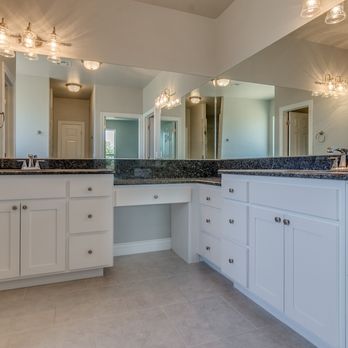 Authentic Custom Homes - a large bathroom with double sinks - General Contractors Near Me - Edmond, Oklahoma Authentic Custom Homes - a large bathroom with double sinks - General Contractors Near Me - Edmond, Oklahoma