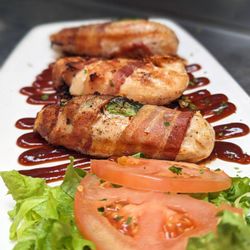 4th & Mill - RATTLE SNAKE BITES
Grilled chicken strips wrapped in
bacon with a slice of fresh jalapeño.
Served with barbecue sauce