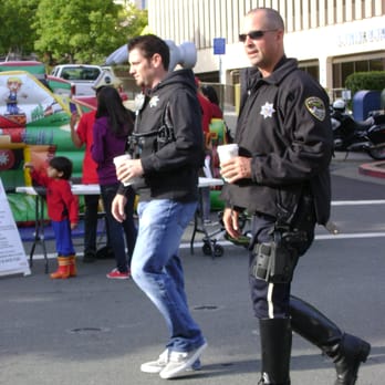 Farmer's Market - a police officer walking down the street - Farmers Market Near Me - San Rafael, California Farmer's Market - a police officer walking down the street - Farmers Market Near Me - San Rafael, California