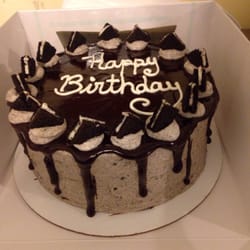 Lauren's Wildflour Bakery - Cookies n Cream cake topped w chocolate ganache