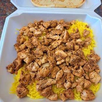Pita Wraps - Today's double rice and extra chicken $21.66 8/15/24 see how little food is here compared to other 2 pictures. - Mediterranean Near Me - Surprise, Arizona