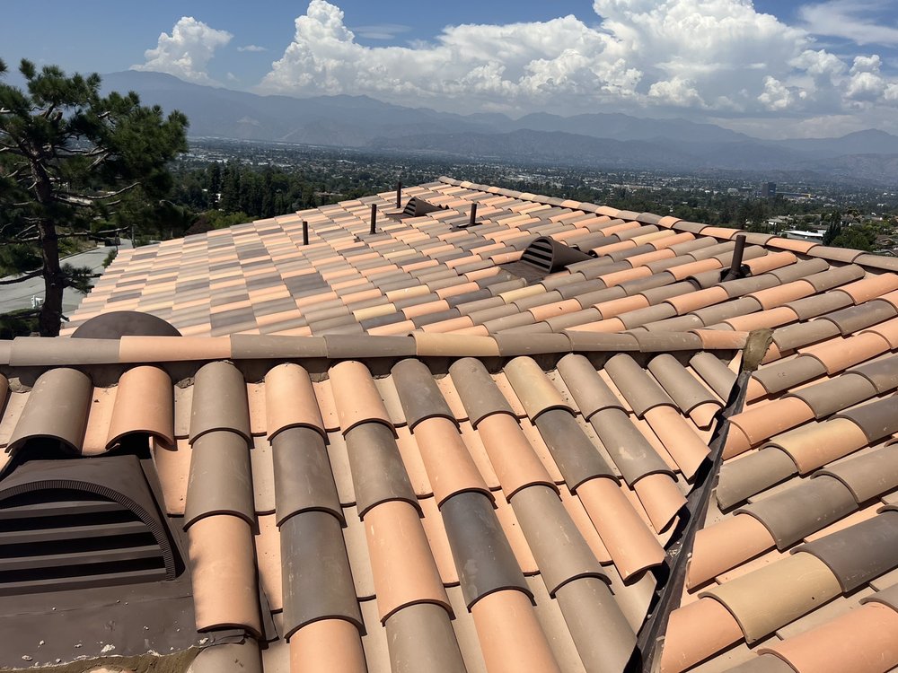 Slide of ARM Roofing Specialists