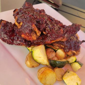 Cilantro And Chive - Riblings served in a Saskatoon berry bbq sauce, roasted potatoes and zucchini - Desserts Near Me - Red Deer, Alberta