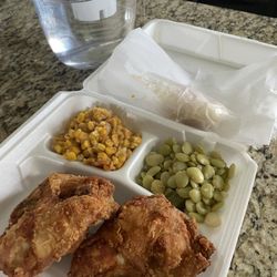Fried chicken with fried corn and Lima beans