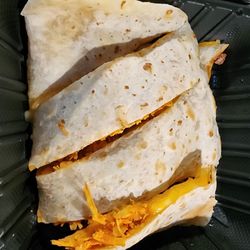 Taqueria La Guacamaya - Burrito tortilla is used for this bad boy. Shredded chicken and cheddar cheese