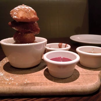 Lucky Monk - House Made "Sticky Donuts"!  Served with a Raspberry, Caramel, and Chocolate dipping sauce! - American Near Me - Barrington, Illinois