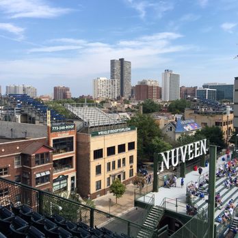Wrigley Field - The seats on nearby buildings. Seems too corporate nowadays. - Stadiums & Arenas Near Me - Chicago, Illinois Wrigley Field - The seats on nearby buildings. Seems too corporate nowadays. - Stadiums & Arenas Near Me - Chicago, Illinois