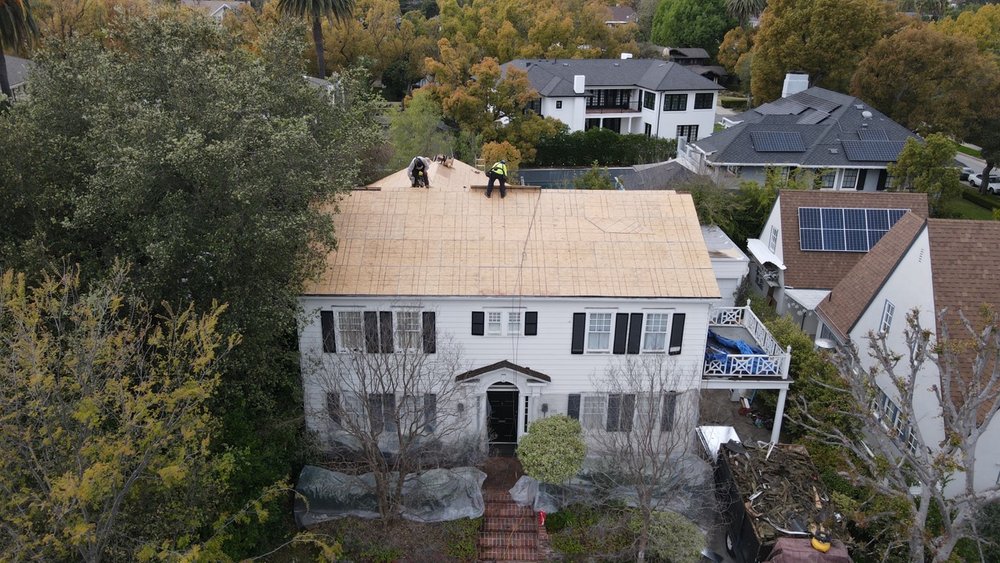 Slide of Rafael and Iris Roofing