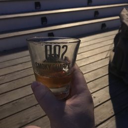 a person holding a glass