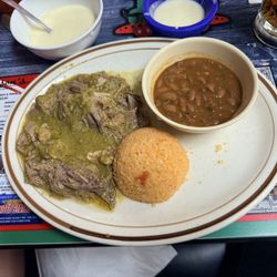 Los Locos Mexican Restaurant - Chile Verde with Rice and Charro Beans.  Cheese dip up top