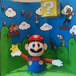 Christopher Michael Mule, DDS - Our creative and talented ladies submitted our office's pumpkin decorating entry!  Love Super Mario!  Very proud of them!