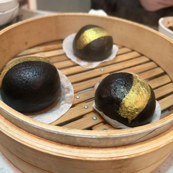 Supreme Dumplings - Charcoal gold lava custard bun w/ gold flakes - Shanghainese Near Me - Bellevue, Washington
