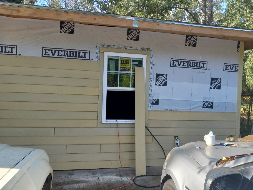 Slide of DJ'S Construction Roofing Siding & Framing