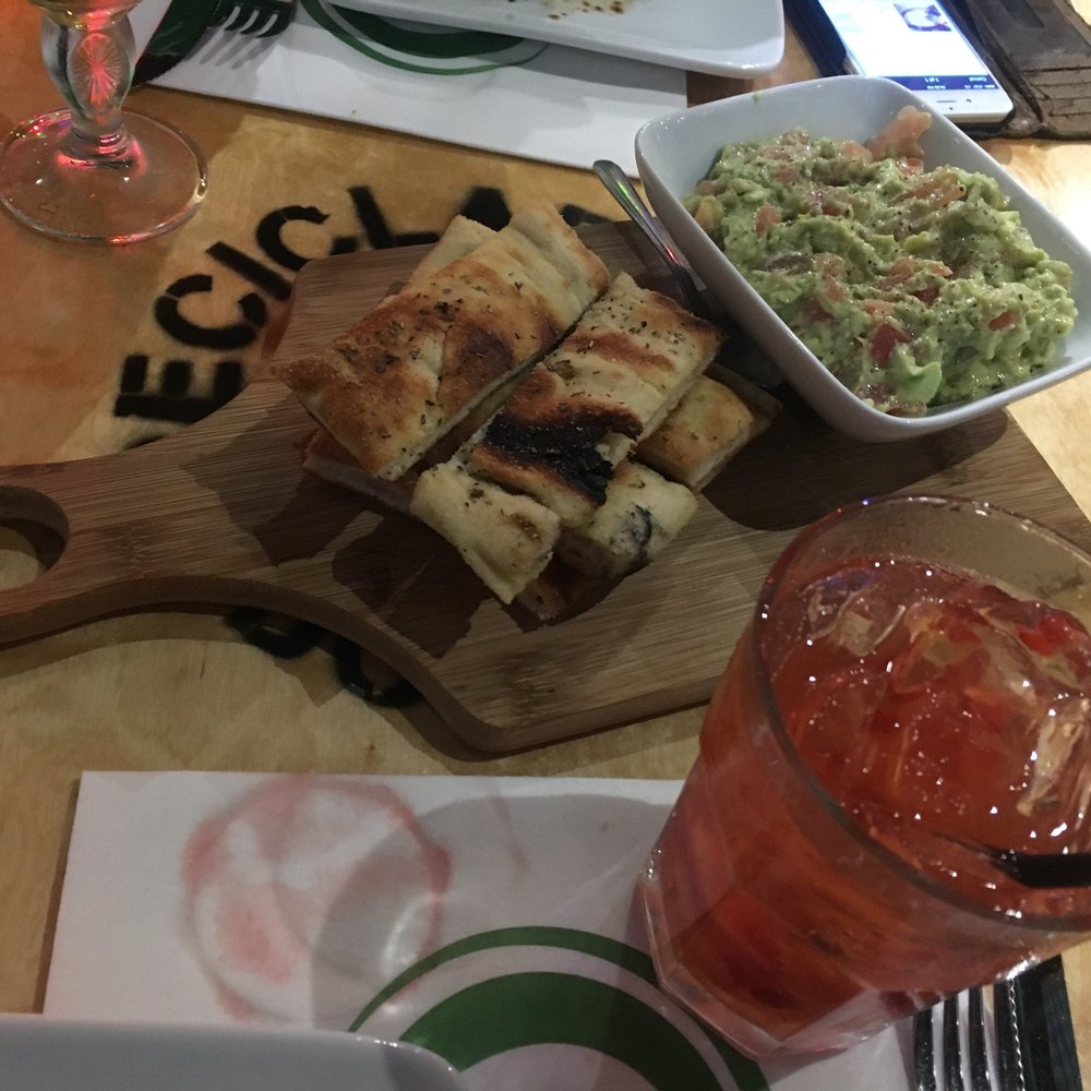 Piola - Avocado dip and focaccia bread. - Pizza Near Me - Doral, Florida Piola - Avocado dip and focaccia bread. - Pizza Near Me - Doral, Florida