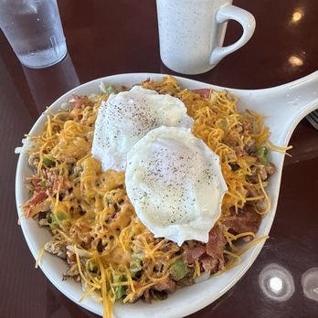 Rhinelander Family Restaurant - Delicious Rhinelander skillet with poached eggs. - Breakfast & Brunch Near Me - Rhinelander, Wisconsin Rhinelander Family Restaurant - Delicious Rhinelander skillet with poached eggs. - Breakfast & Brunch Near Me - Rhinelander, Wisconsin