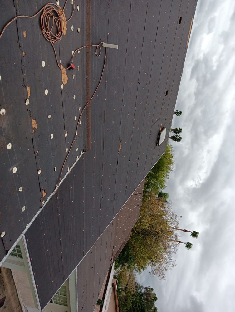 Slide of Rubio R Roofing