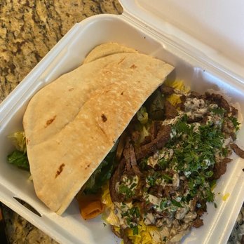 Sahara Middle Eastern Eatery - a burrito and salad in a styrofoam container - Middle Eastern Near Me - Albuquerque, New Mexico Sahara Middle Eastern Eatery - a burrito and salad in a styrofoam container - Middle Eastern Near Me - Albuquerque, New Mexico