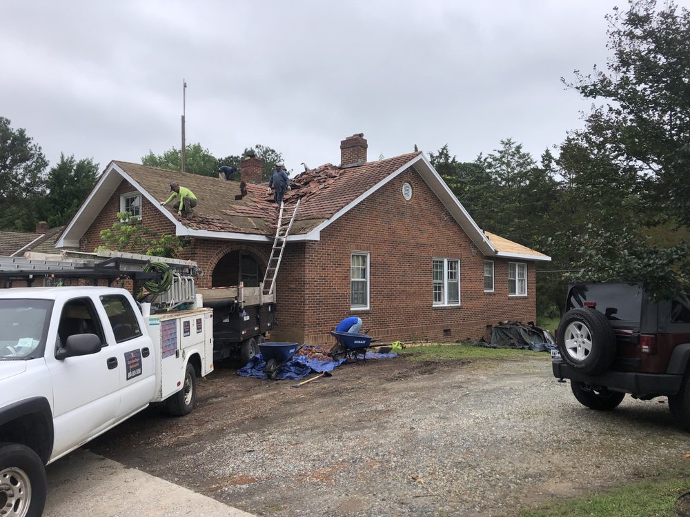 Slide of Ray's Roofing & Restoration