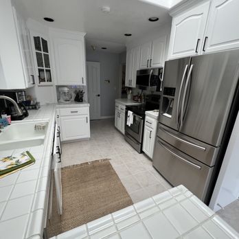 Deluxe Painting - Kitchen cabinets after painting complete! - Painters Near Me Deluxe Painting - Kitchen cabinets after painting complete! - Painters Near Me
