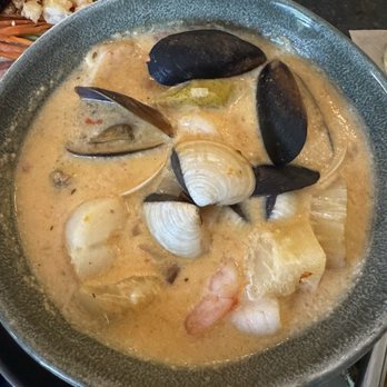 Tlalli - Tapado de Coco Mussels, clams, scallops, shrimp, sofrito rojo, Caribbean coconut milk broth, yucca, green plantains - Latin American Near Me - Ashland, Oregon Tlalli - Tapado de Coco Mussels, clams, scallops, shrimp, sofrito rojo, Caribbean coconut milk broth, yucca, green plantains - Latin American Near Me - Ashland, Oregon