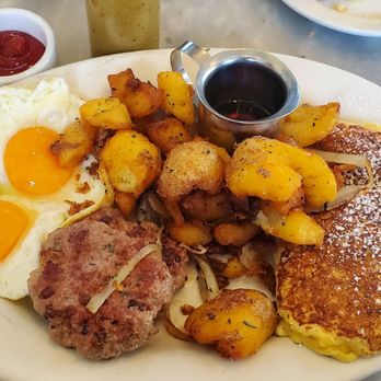 Plow - The plow with house pork sausage. 2 sunny side eggs, amazing potatoes and 2 lemon ricotta pancakes. - Breakfast & Brunch Near Me - San Francisco, California Plow - The plow with house pork sausage. 2 sunny side eggs, amazing potatoes and 2 lemon ricotta pancakes. - Breakfast & Brunch Near Me - San Francisco, California