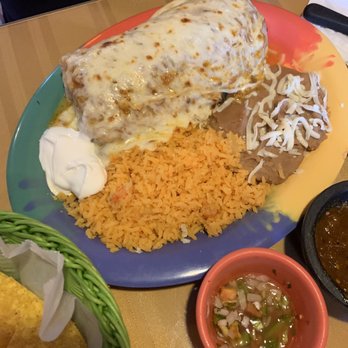 Mely's Mexican Cuisine - Steak burrito suizo, rice, beans. - Mexican Near Me - Tinley Park, Illinois Mely's Mexican Cuisine - Steak burrito suizo, rice, beans. - Mexican Near Me - Tinley Park, Illinois
