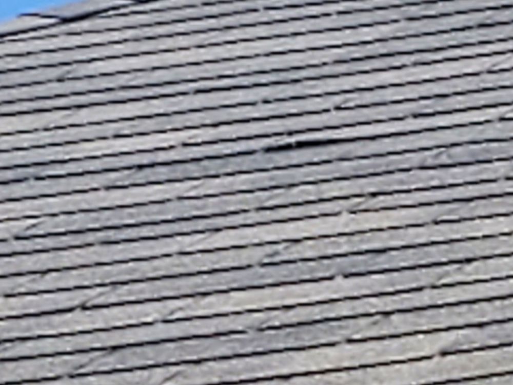 Slide of Guaranteed Roof