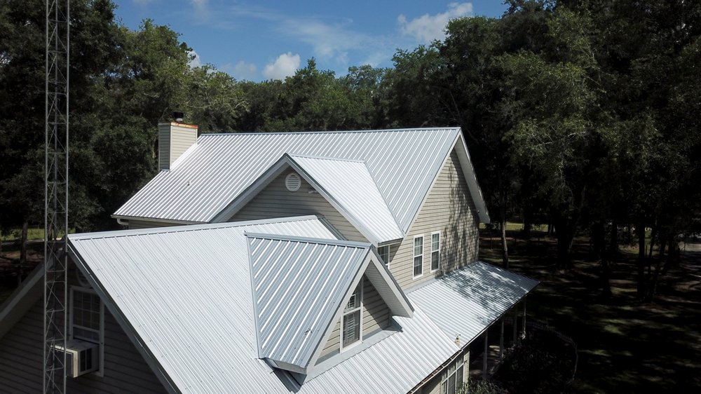 Slide of TMT Roofing