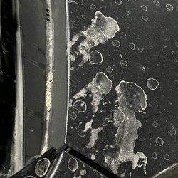 Community Management Advisors - This is an example of the cement projectiles that were sprayed onto my brand new vehicle.