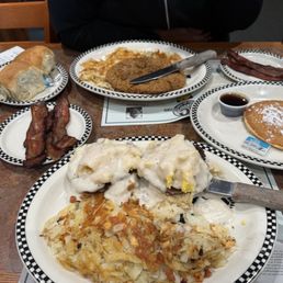 Southern Scramble Chicken Fried Steak & Eggs with biscuits(minus the gravy and eggs) Sides of bacon Side of one Pancake