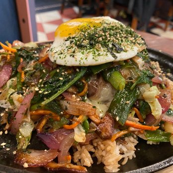 Kitchen Story - Open Face: Wagyu patty, spinach, mushroom, white cheddar, onion, fried egg, ginger rice, demi-glace - Breakfast & Brunch Near Me - Oakland, California