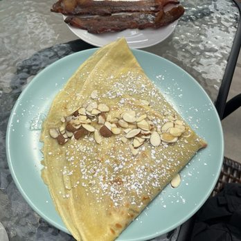 Hangar Cafe - Side of bacon, honey sweet ricotta crepe - Breakfast & Brunch Near Me - Seattle, Washington