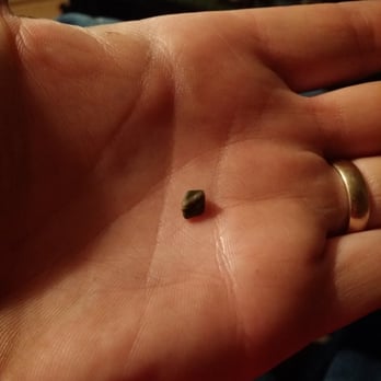 Panda Express - A rock found in our food. We didn't have any rice only chowmein. - Chinese Near Me - Caldwell, Idaho
