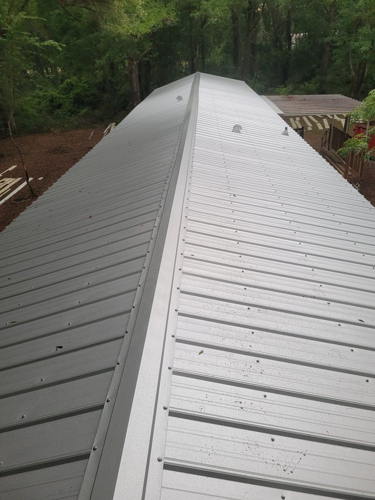 Slide of Moore Elite Roofing