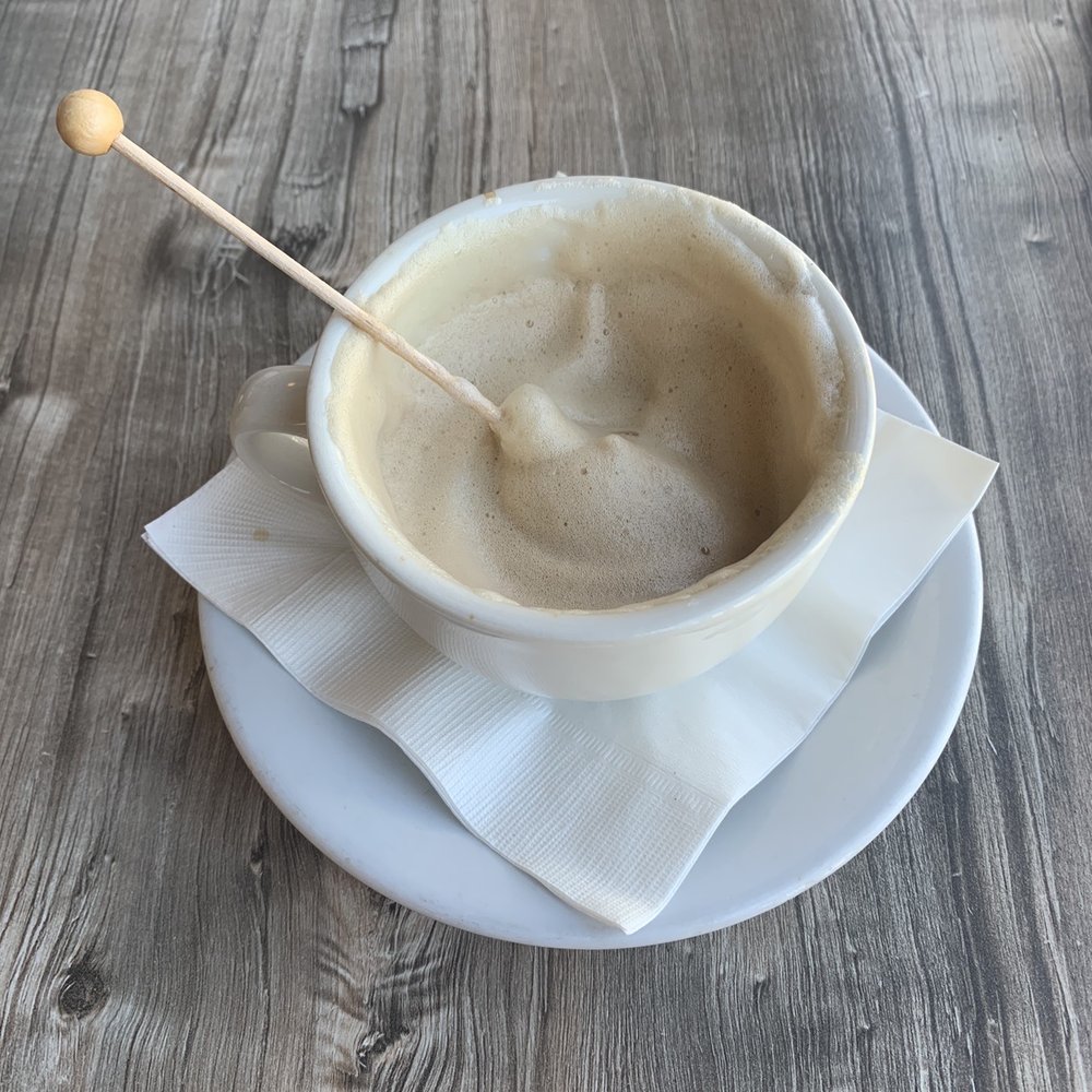 Benedict's - Cappuccino with rock candy stir stick- I love how unique and delicious this was! - American Near Me - Pinellas Park, Florida Benedict's - Cappuccino with rock candy stir stick- I love how unique and delicious this was! - American Near Me - Pinellas Park, Florida