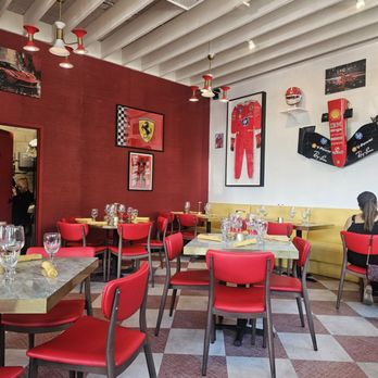Maranello - View of inside seating. Also have large patio and nice bar seating showing F1 races - Italian Near Me - San Diego, California Maranello - View of inside seating. Also have large patio and nice bar seating showing F1 races - Italian Near Me - San Diego, California