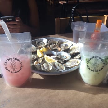 Claw Daddy's - Dozen oysters with claw daddy's cocktail pouches - Cajun/Creole Near Me - New York, New York Claw Daddy's - Dozen oysters with claw daddy's cocktail pouches - Cajun/Creole Near Me - New York, New York