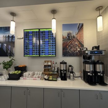 The Club BWI - Drip coffee, tea, fruits and a mini fridge at the bottom for soda - Airport Lounges Near Me - Baltimore, Maryland The Club BWI - Drip coffee, tea, fruits and a mini fridge at the bottom for soda - Airport Lounges Near Me - Baltimore, Maryland