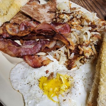 North Star Restaurant - My breakfast: Two fried eggs over easy,  a pork tenderloin, bacon, homefries, and white toast with butter. - Breakfast & Brunch Near Me - Buchanan, Virginia