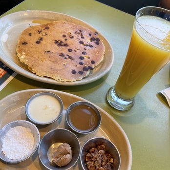 Snooze, an A.M. Eatery - Cinnamon roll pancake and mimosa - Breakfast & Brunch Near Me - Lone Tree, Colorado Snooze, an A.M. Eatery - Cinnamon roll pancake and mimosa - Breakfast & Brunch Near Me - Lone Tree, Colorado