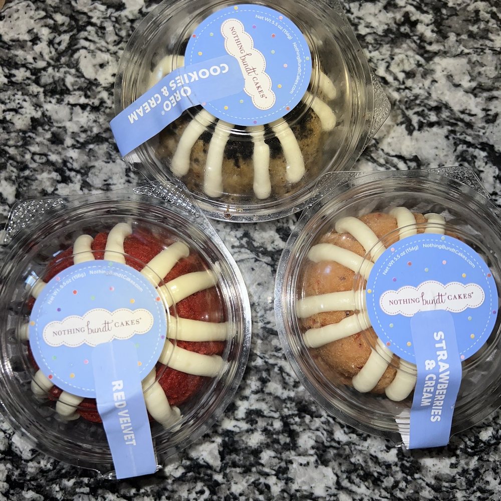 three bundt cakes in plastic containers three bundt cakes in plastic containers