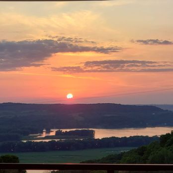 Sunset Grille - a view of the sun setting over a lake - American Near Me - Galena, Illinois