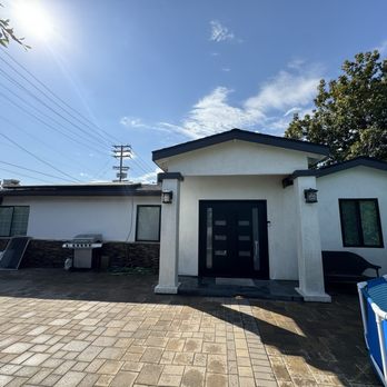 Stonework Design & Build - White stucco, brand new pillars and porch, new double doors from single, stack stone - Masonry/Concrete Near Me Stonework Design & Build - White stucco, brand new pillars and porch, new double doors from single, stack stone - Masonry/Concrete Near Me