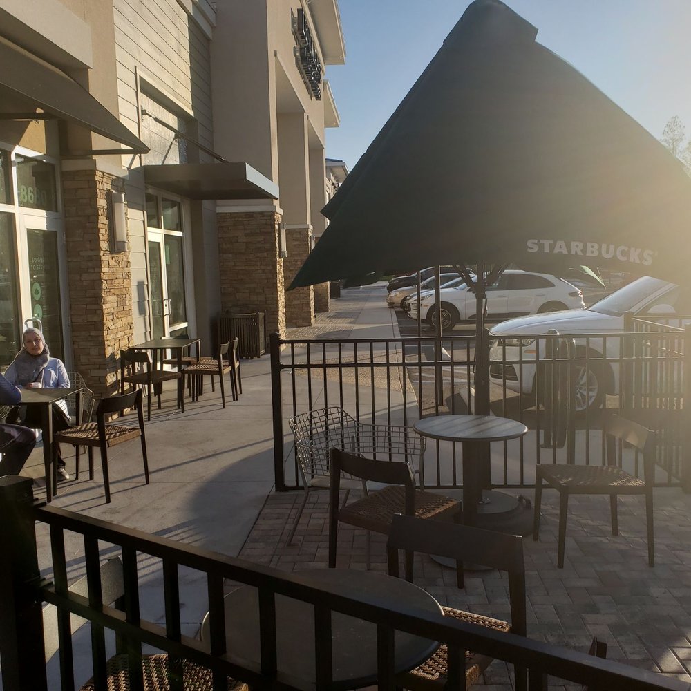 Outside seating near entrance (left) Outside seating near entrance (left)